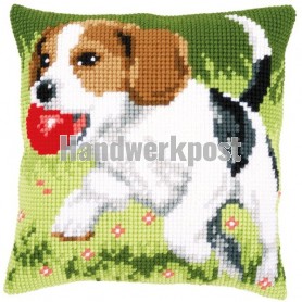 kruissteekkussen spelende hond