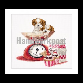 borduurpakket puppy's op weegschaal