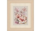 borduurpakket magnolia's met bloemen achtergrond