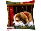 kruissteekkussen hond in de boekenkast