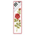 borduurpakket boekenlegger, rode roos met pianotoetsen